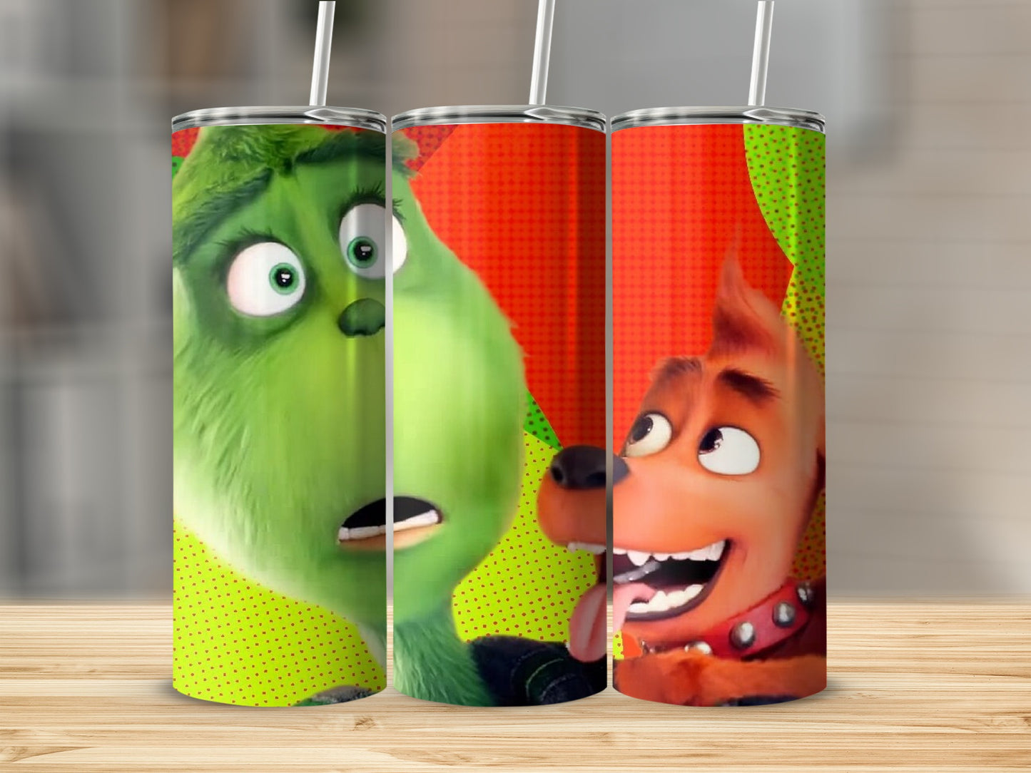 The Grinch and Max the dog on a green and red polka dot tumbler.
