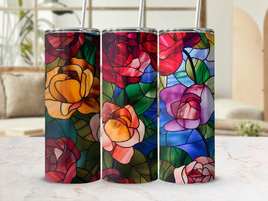 Three tumblers featuring stained glass rose patterns on a marble surface.