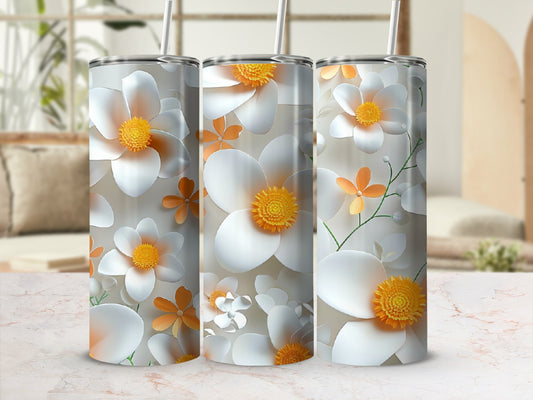 Three tumblers with white and orange floral pattern.