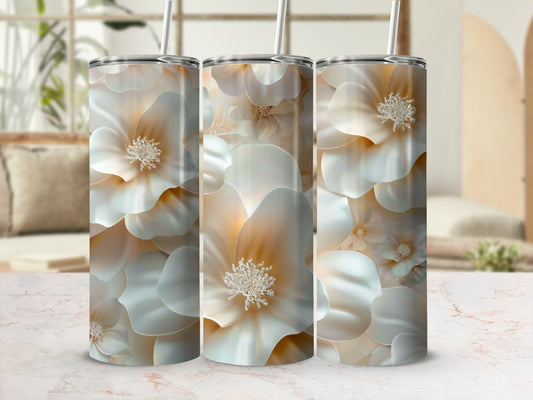 Three tumblers adorned with a soft floral pattern.
