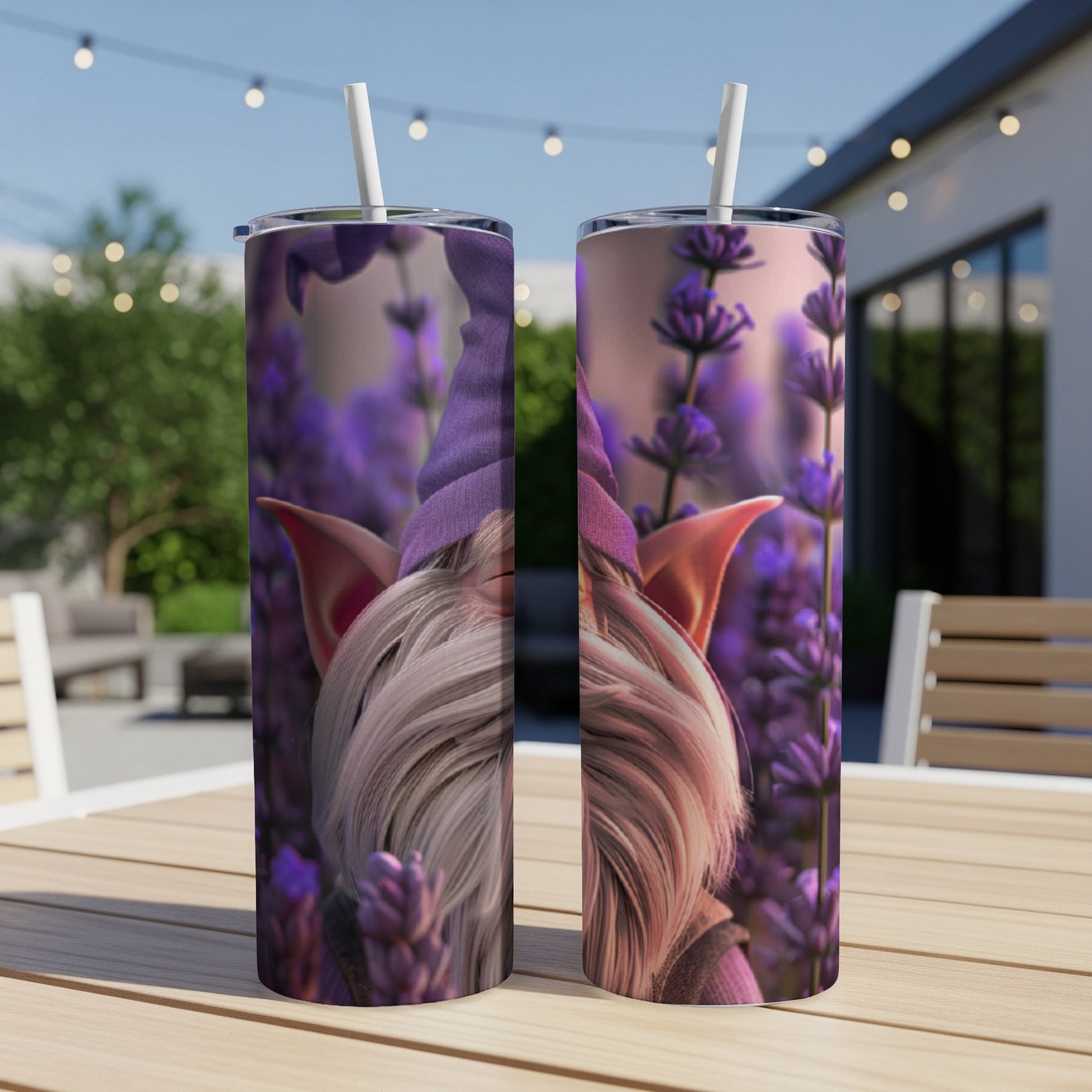 Two tumblers featuring a gnome peeking through lavender on a wooden table.