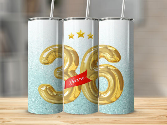 Gold 36 with ribbon and stars on glitter tumbler.
