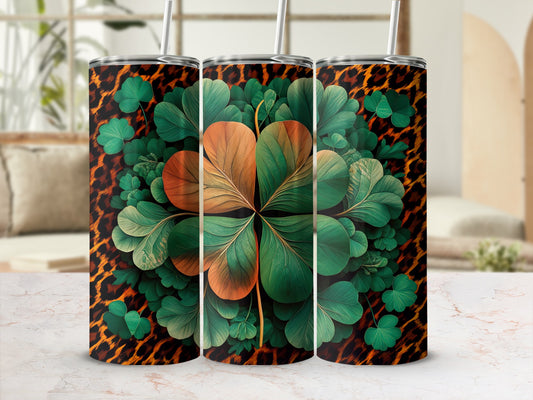 Three tumblers with a leopard print background and a four-leaf clover design.
