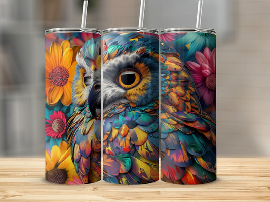 Colorful owl design on three tumblers with floral accents.
