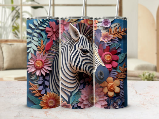 Zebra head and floral pattern on a blue cylindrical tumbler.
