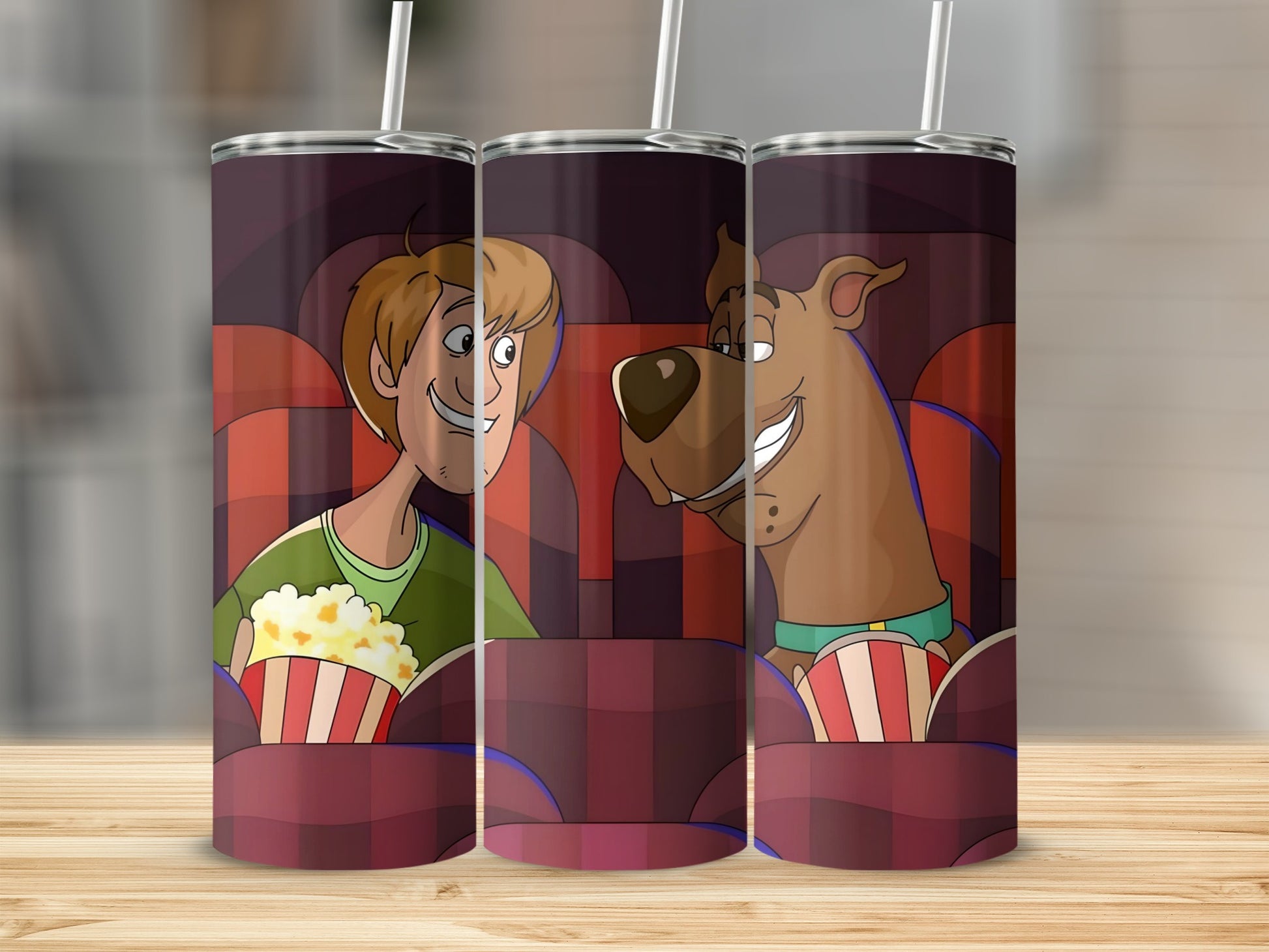 Scooby-Doo and Shaggy at the movies with popcorn.