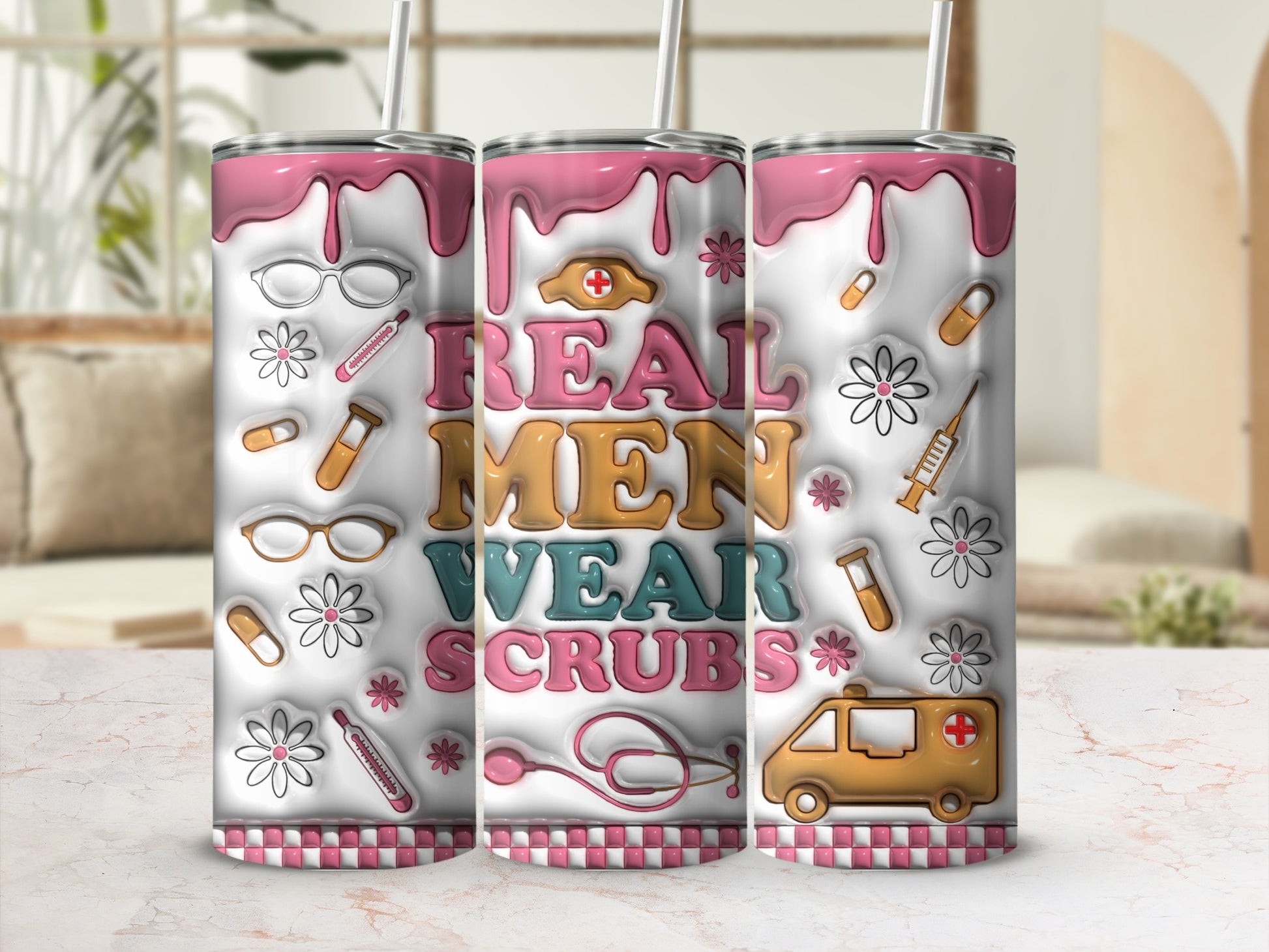 Pink and white tumbler with "Real Men Wear Scrubs" text and medical icons.