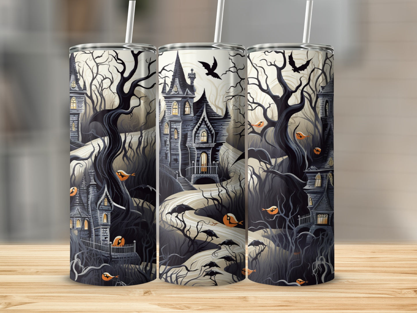 Three tumblers with a Halloween-themed spooky castle and forest design.