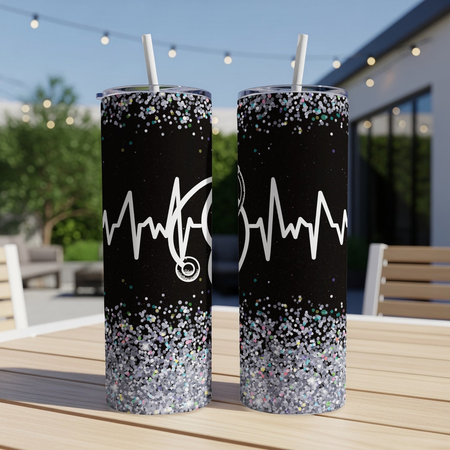Two tall tumblers with a white stethoscope and glitter design.
