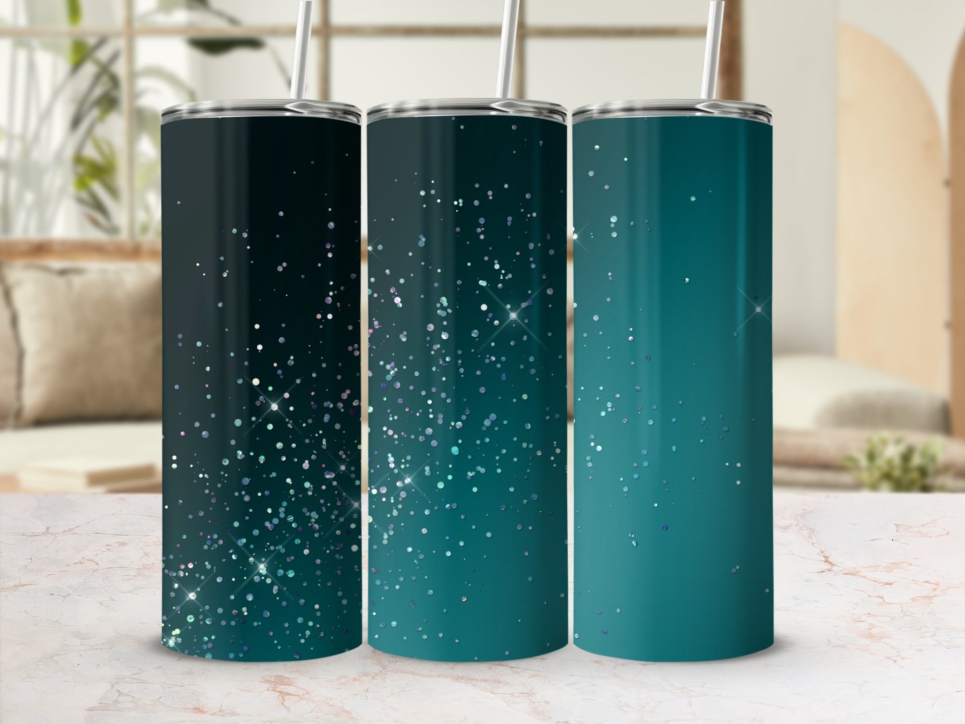 Three tumblers with glitter accents, various shades of blue and teal.