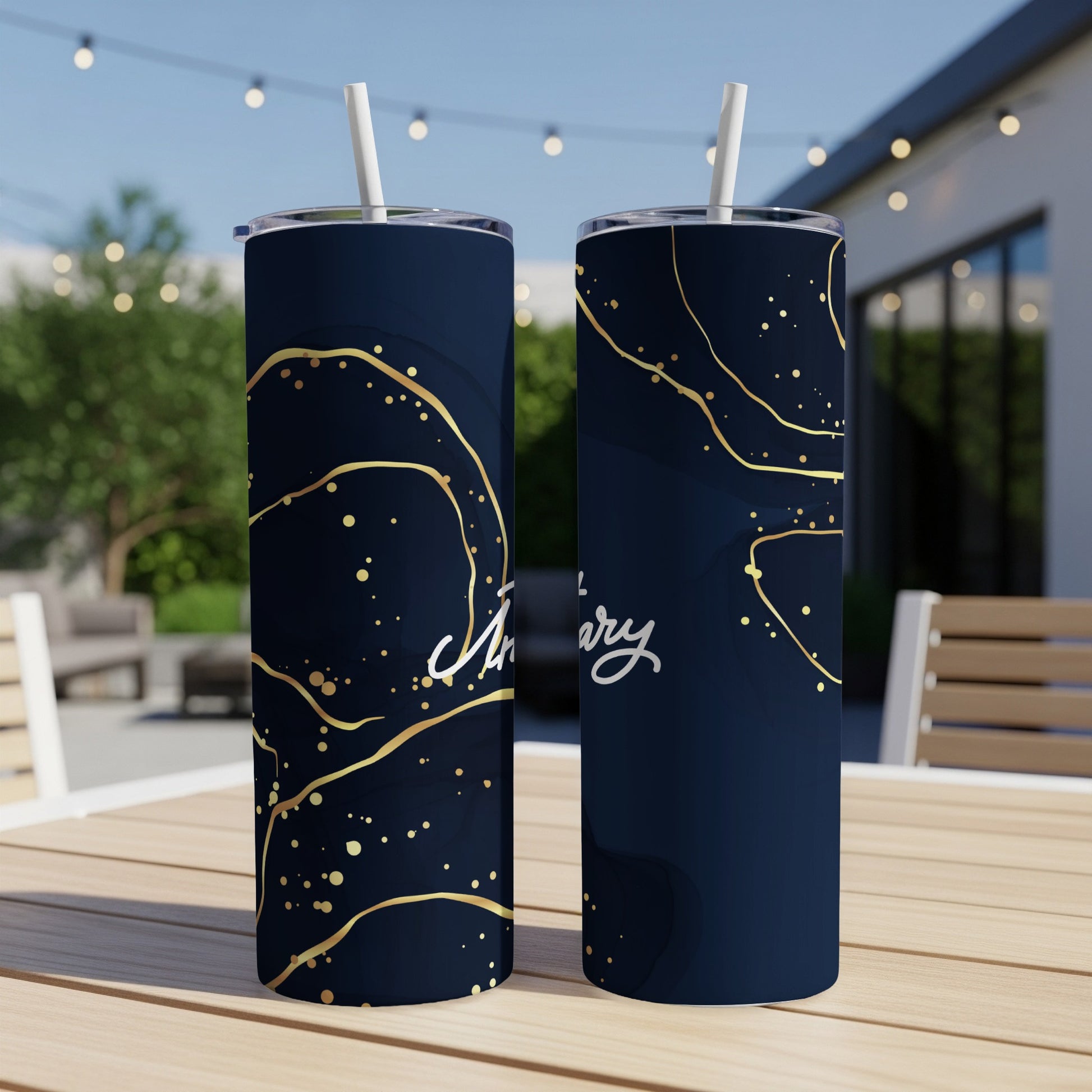 Two dark blue tumblers with gold abstract marble design and "Anniversary" text.