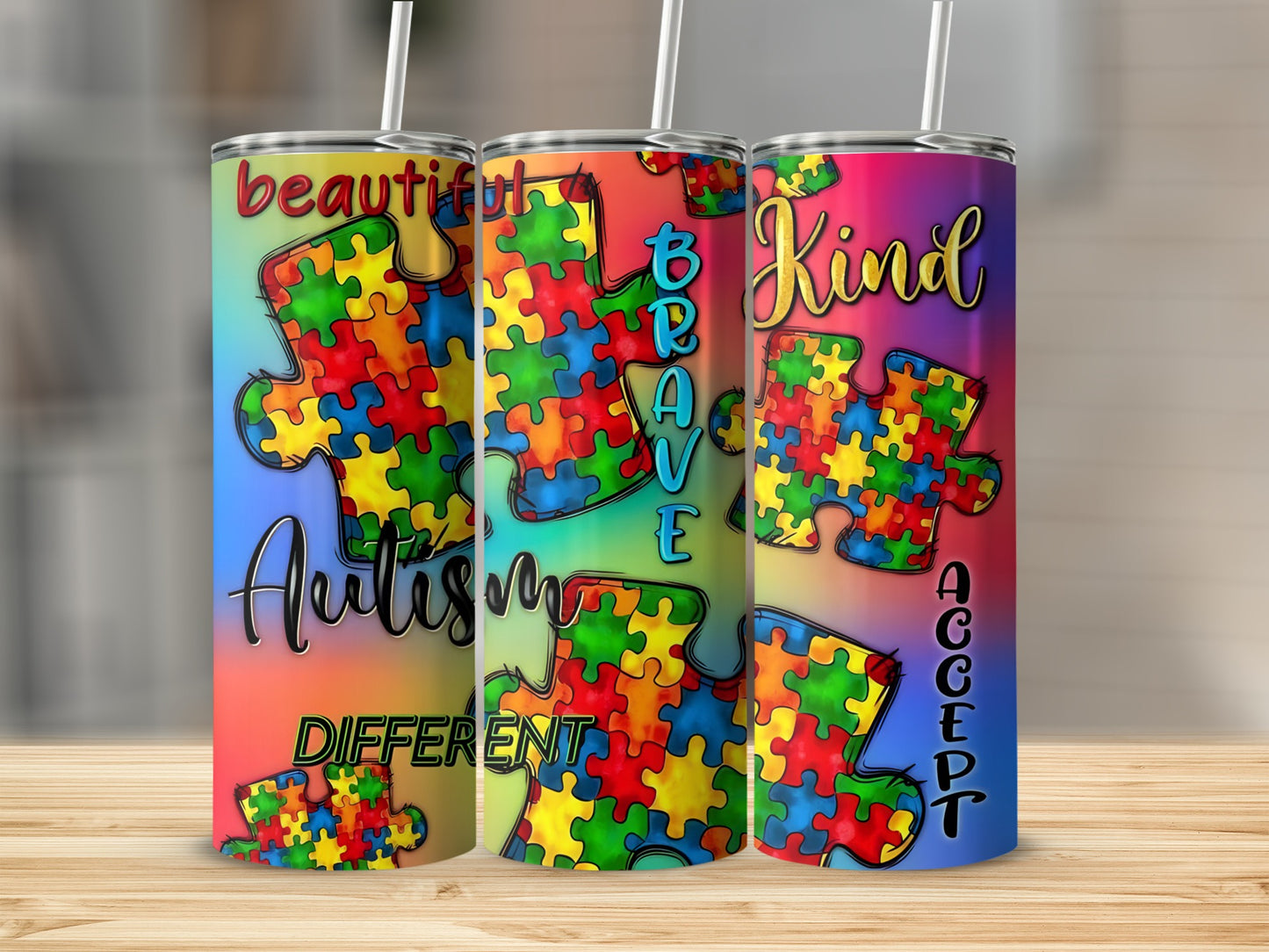 Tumblers with autism puzzle pieces and the words "Beautiful Brave Kind."
