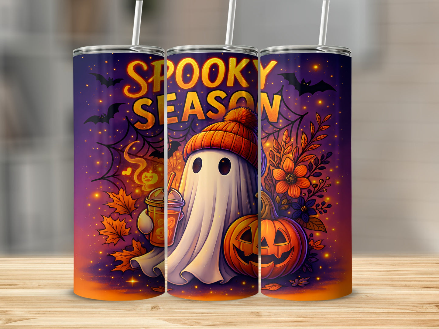 Halloween tumblers with spooky season text, ghost, pumpkin, and fall leaves design.