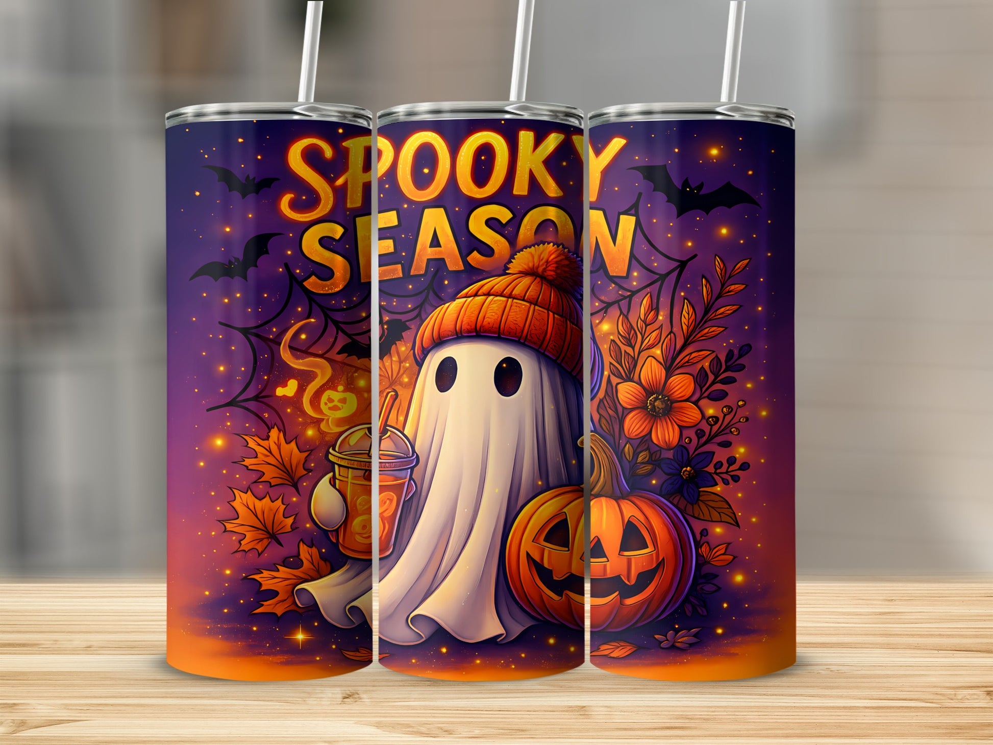 Halloween tumblers with spooky season text, ghost, pumpkin, and fall leaves design.