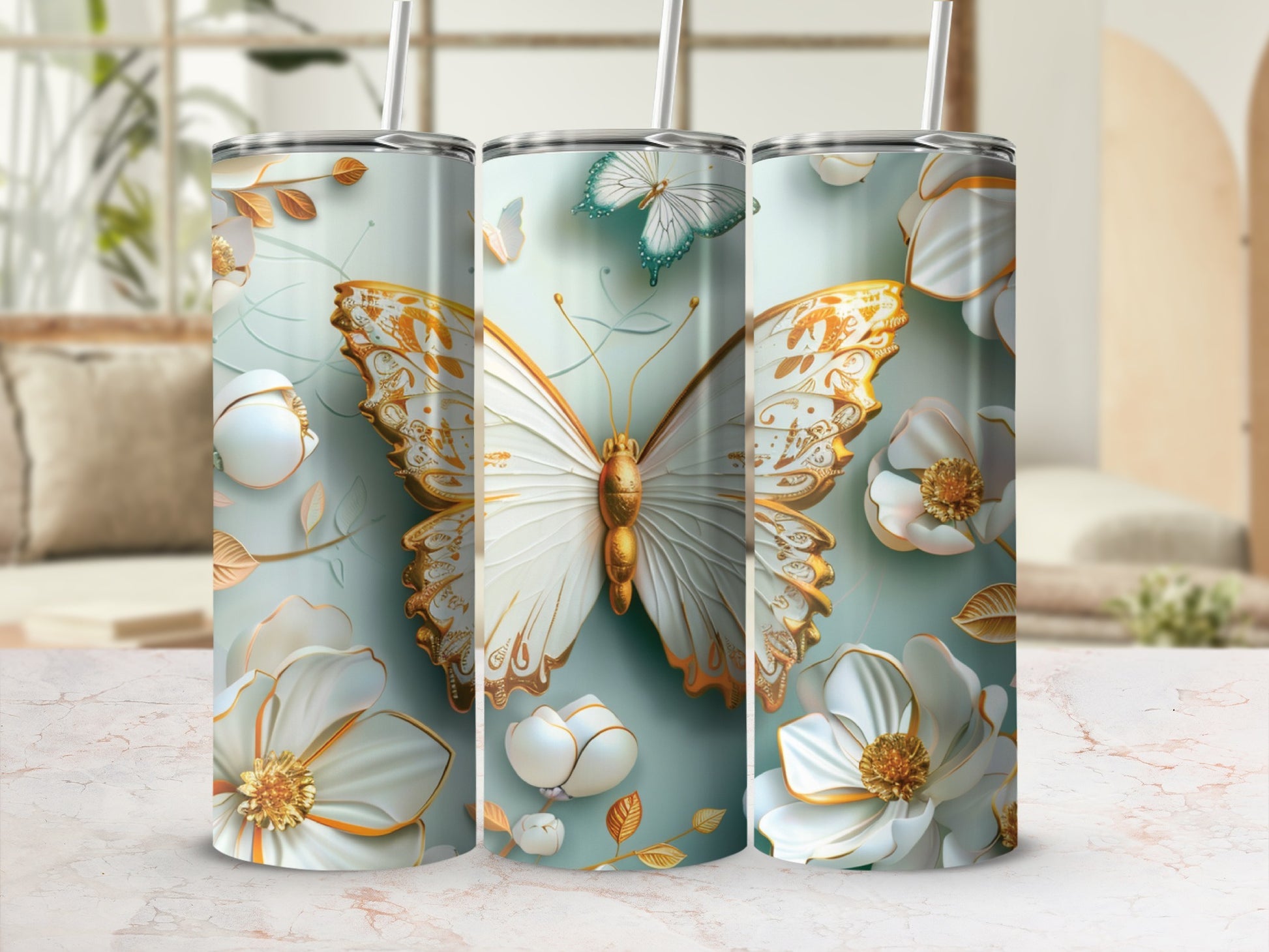White and gold butterfly with floral accents on a pale blue tumbler.