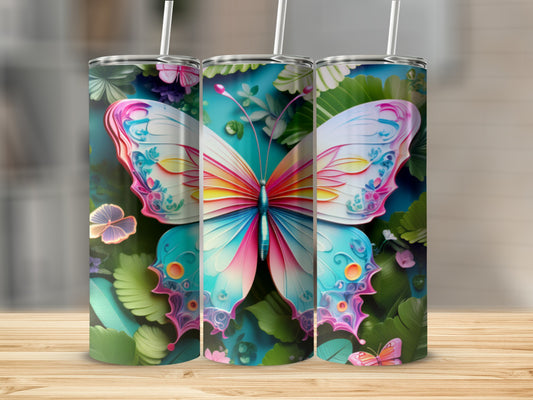 Three tumblers with vibrant butterfly and floral designs.