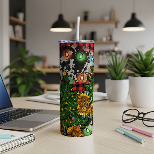 Christmas tree and sunflowers on a cow print tumbler with lights.