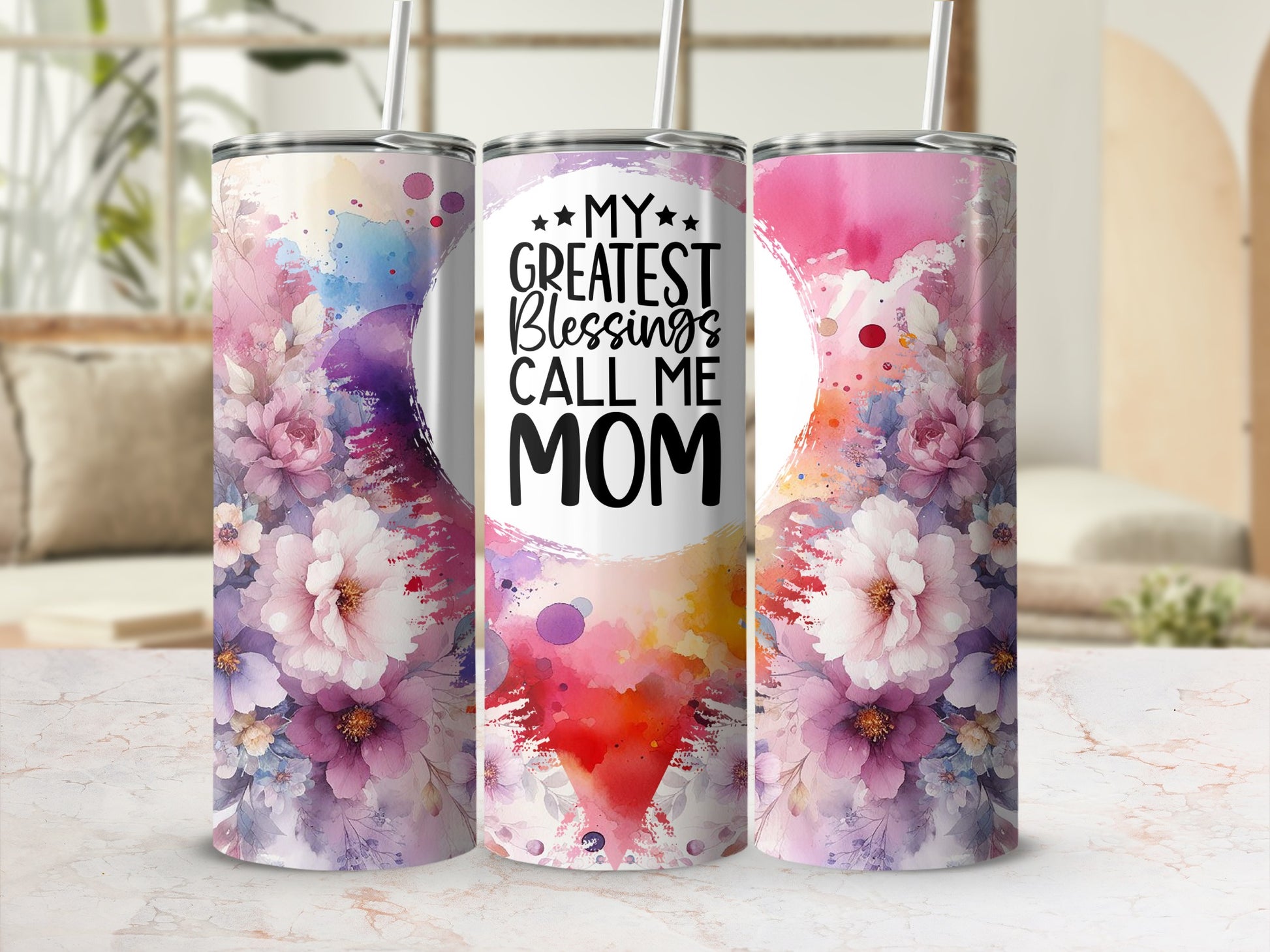 Floral tumbler with "My Greatest Blessings Call Mom" text.