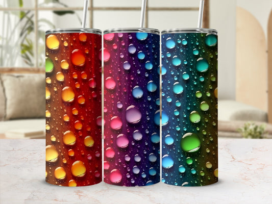 Three tumblers with colorful, bubbly, gradient designs.