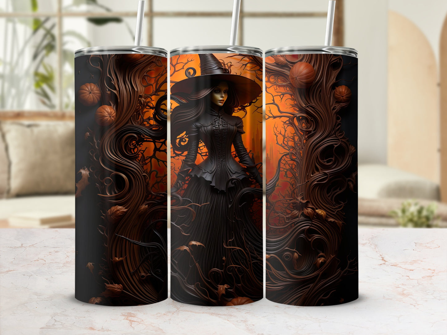 Tumbler with witch, pumpkins, and spooky tree branches on an orange background.
