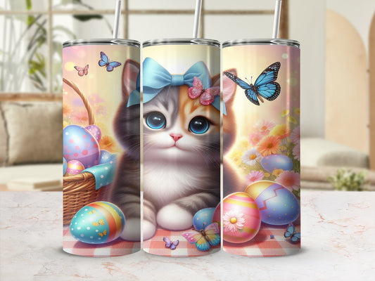 Easter kitten with butterflies and painted eggs on a pink gingham background.