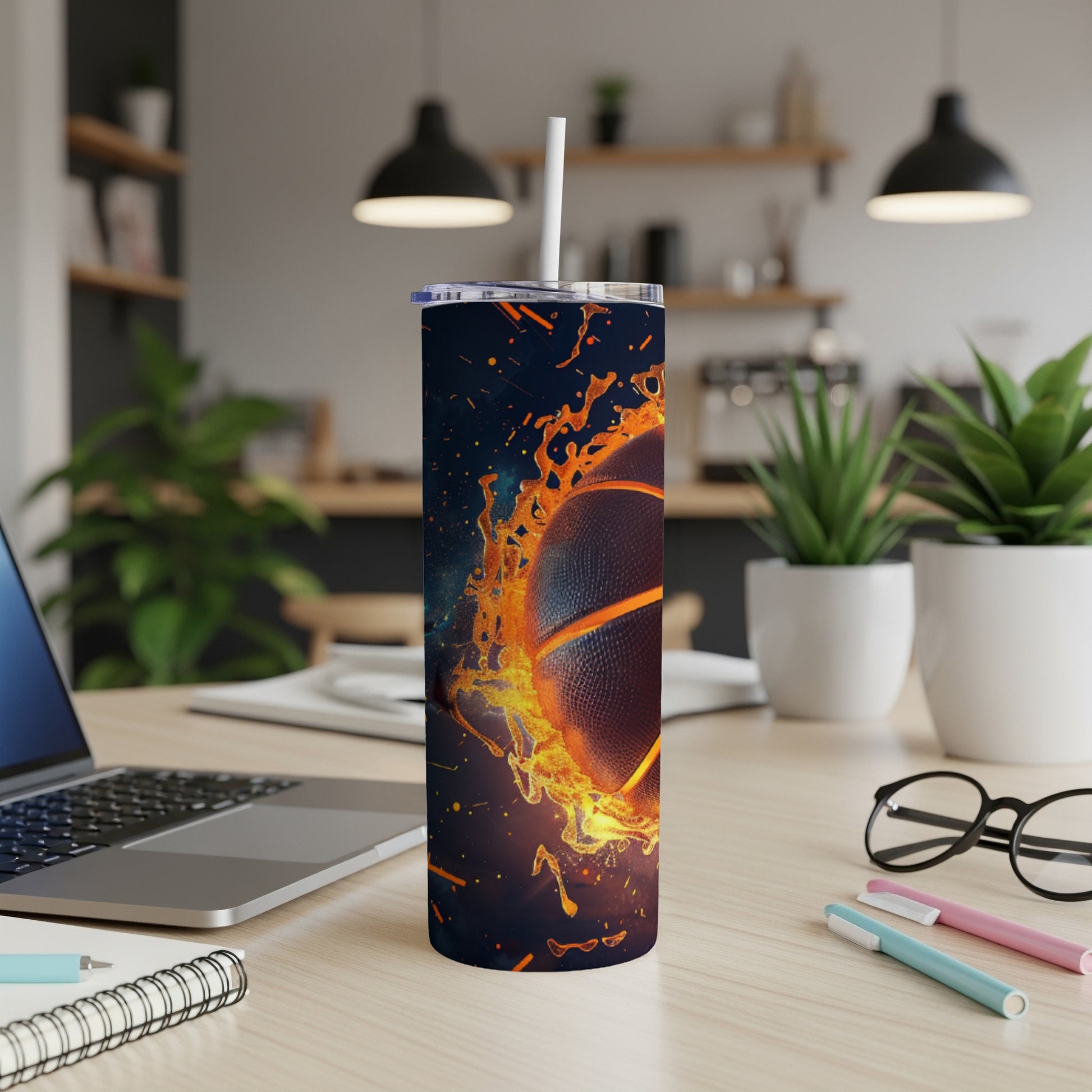 Basketball on fire design on a tumbler with a straw.
