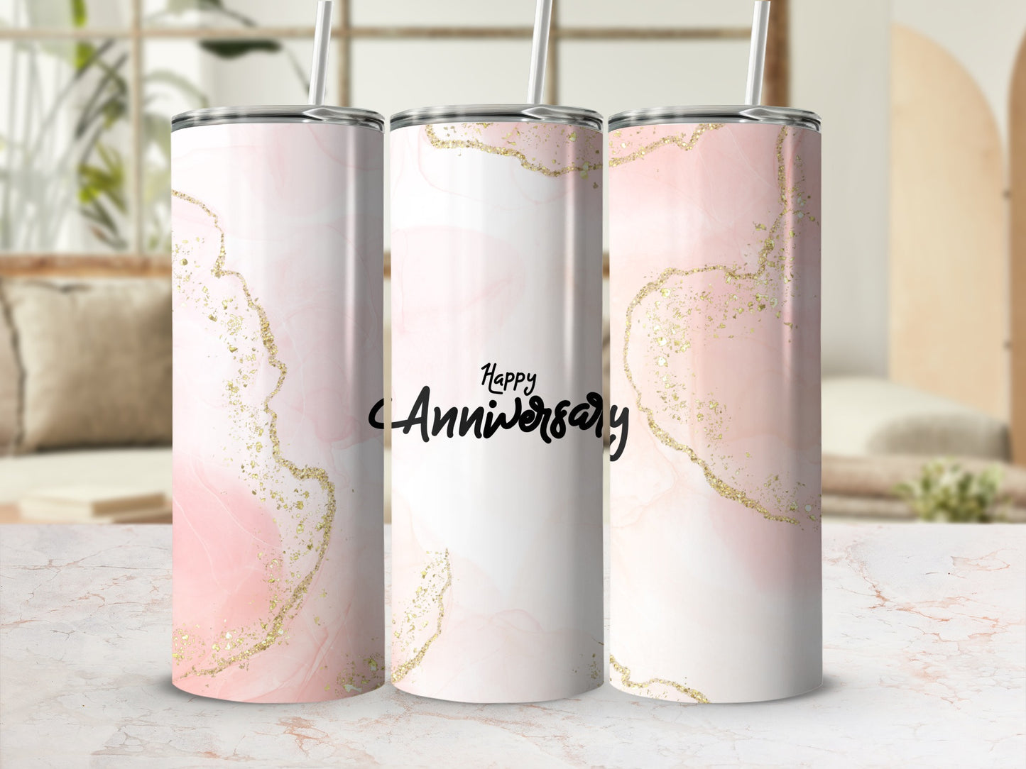 Pink marble tumbler with gold glitter and "Happy Anniversary" text.