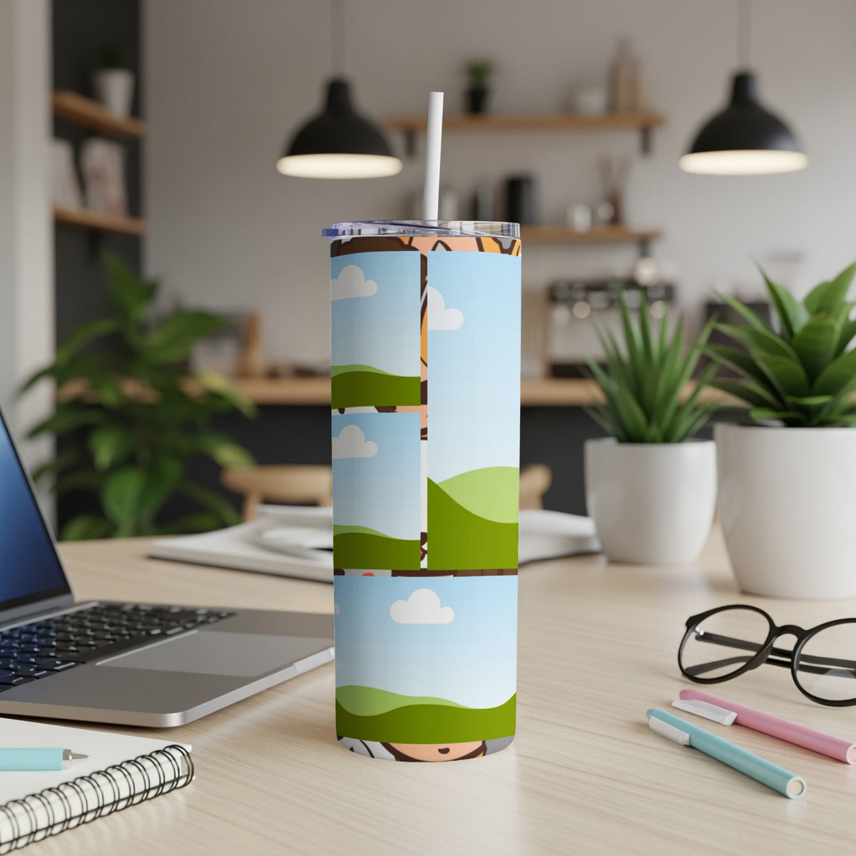 Tall tumbler with a cartoon landscape and character design, featuring a straw.
