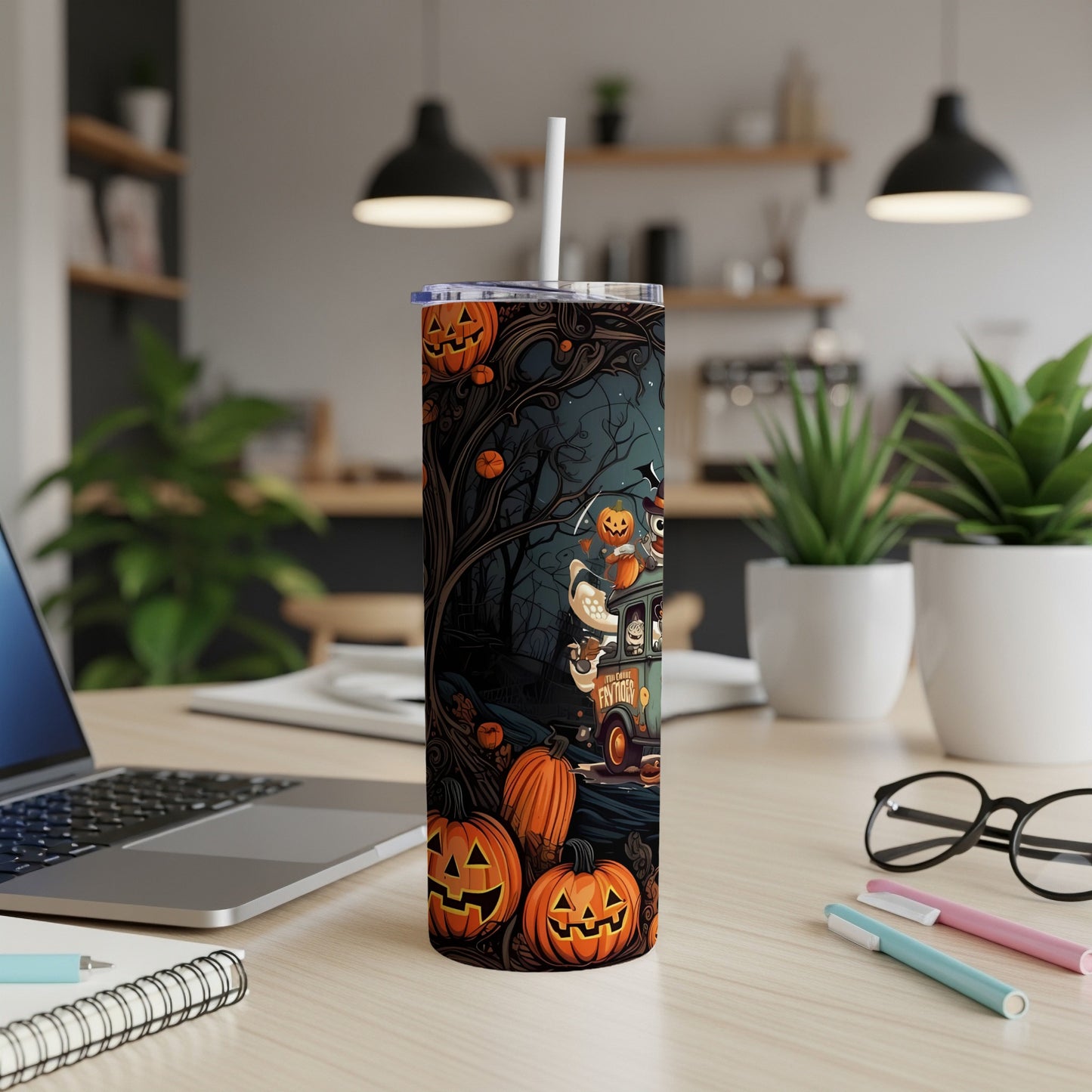 Halloween tumbler with pumpkins, a spooky scene, and a black van.