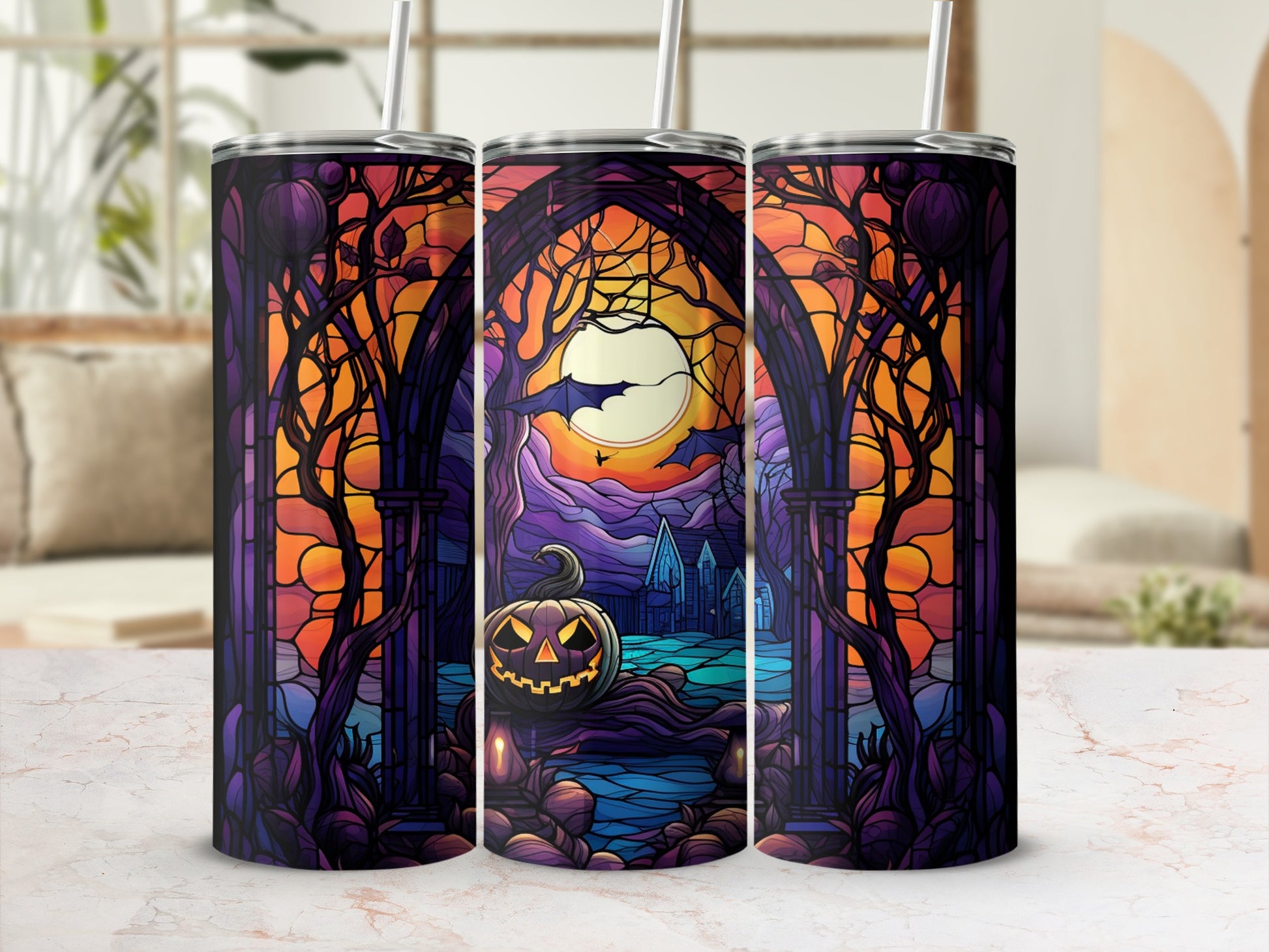 Three tumblers with a Halloween stained-glass archway design.