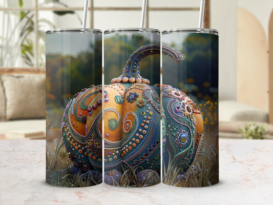 Three tumblers featuring a richly decorated pumpkin design with a rustic outdoor background.
