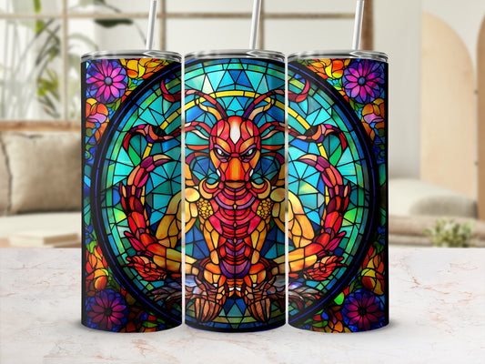 Stained glass dragon design on a tumbler with colorful floral border.