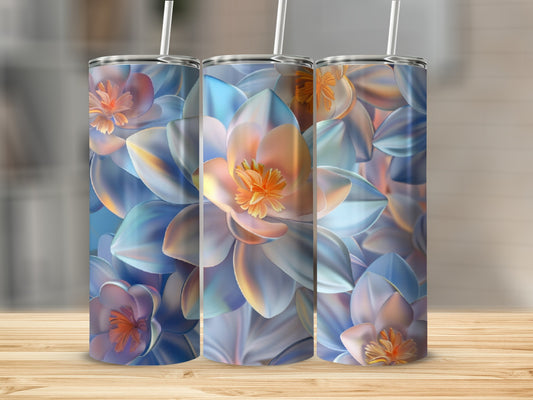 Three tumblers with iridescent lotus flower designs on a wooden surface.