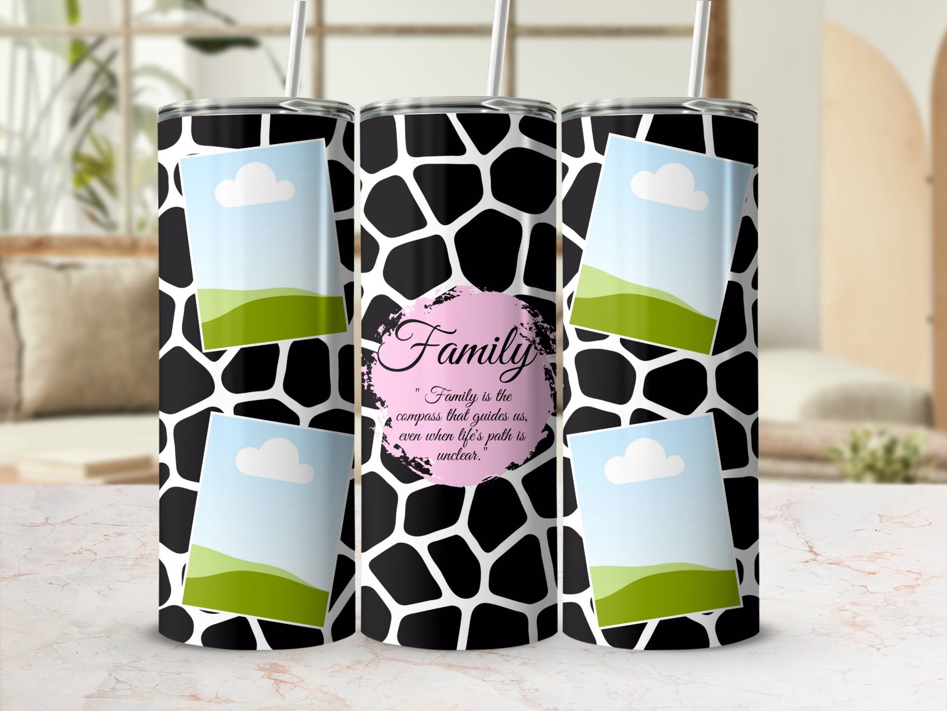 Giraffe print tumbler with photo frames and quote about family.