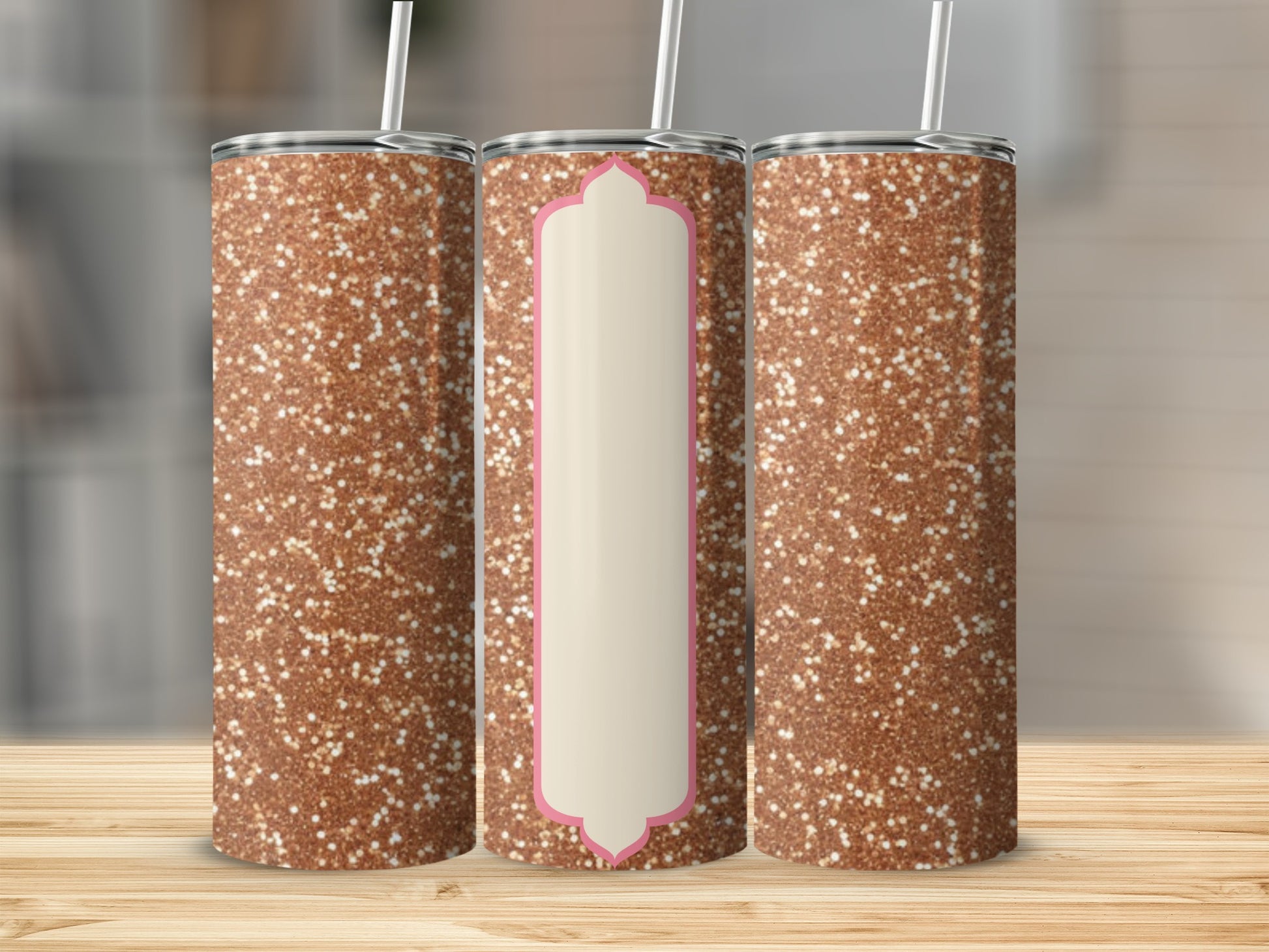 Glitter tumbler with a decorative pink and cream label.