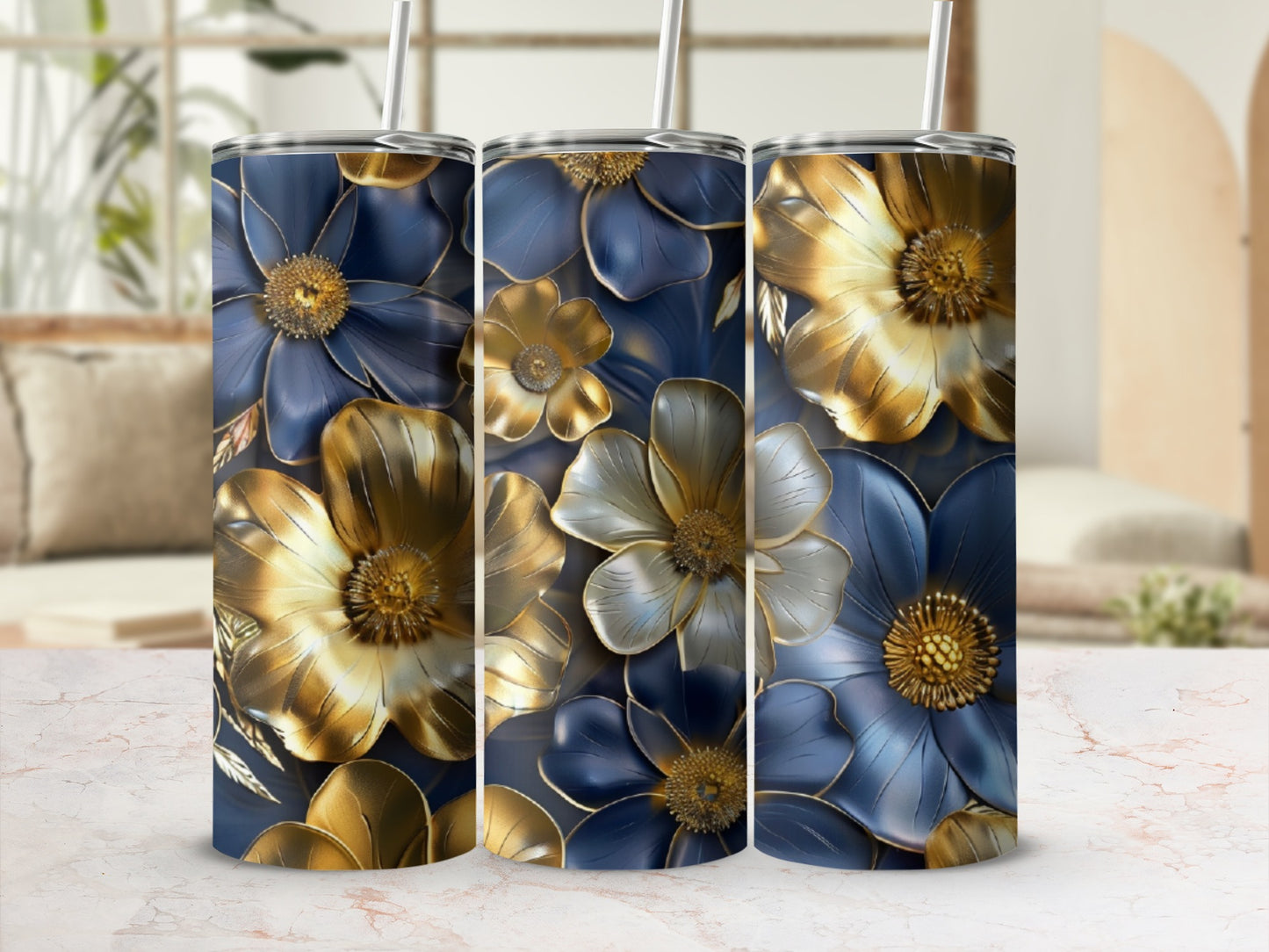 Three tumblers with blue and gold floral patterns.