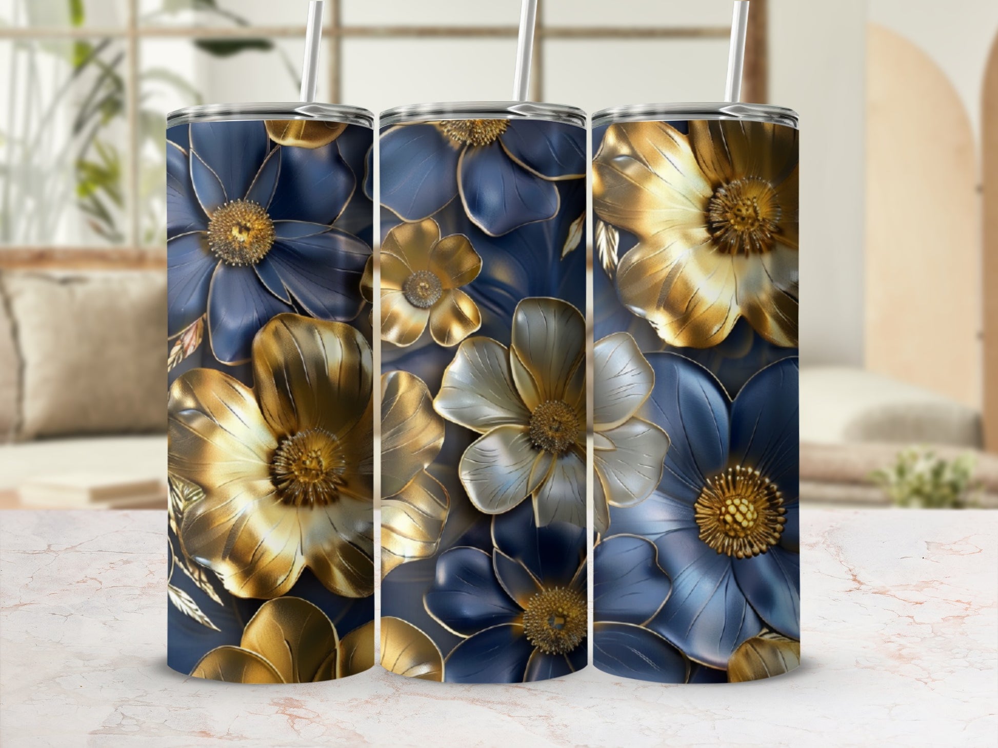 Three tumblers with blue and gold floral patterns.
