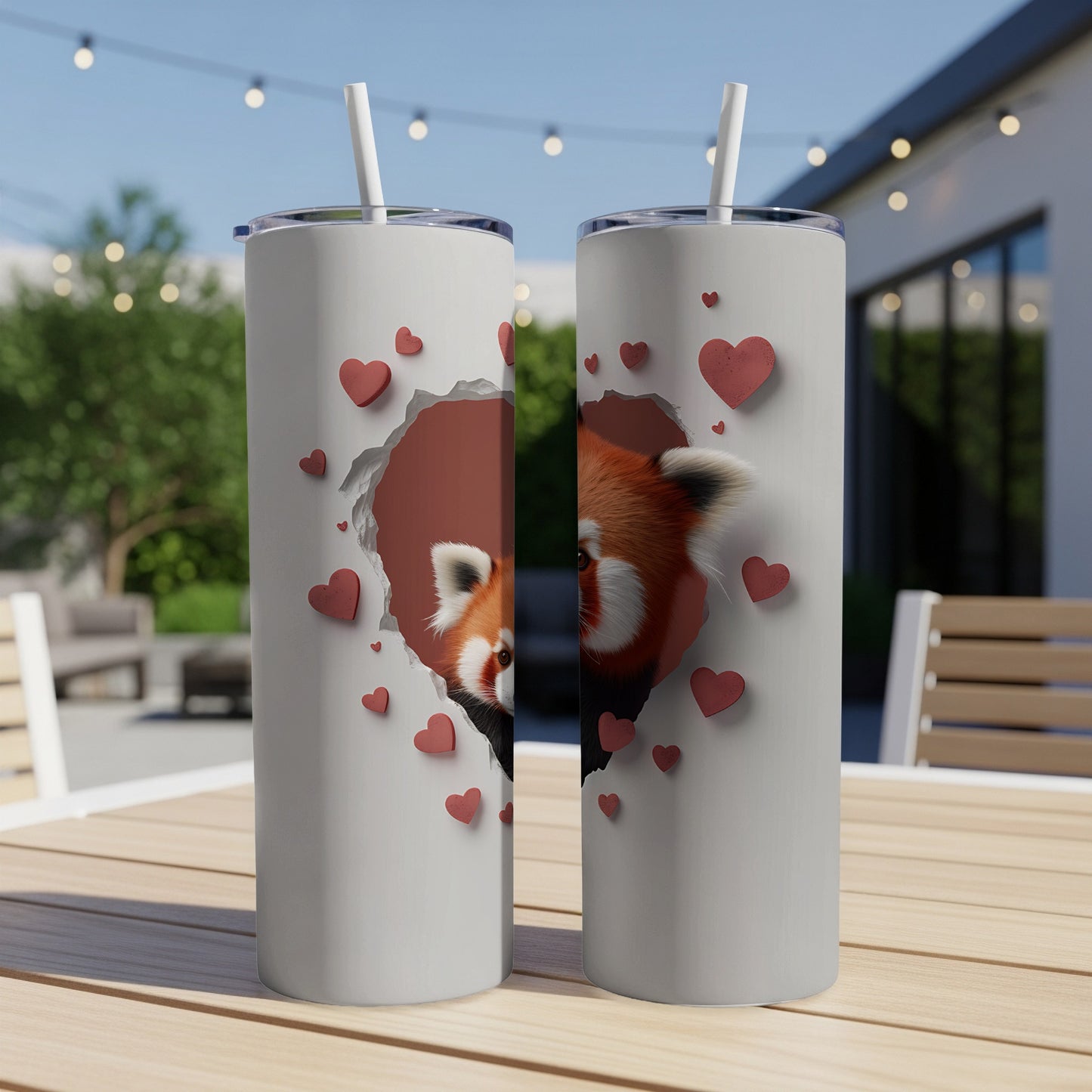 Two tumblers with red panda peeking through torn heart design.