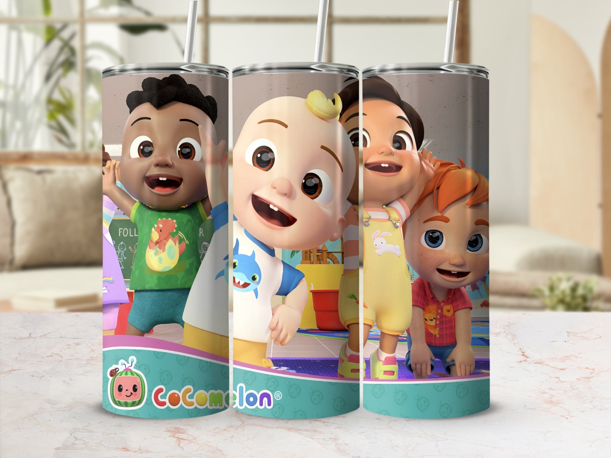 Cocomelon characters JJ, Cody, and Nina smiling on a tumbler.