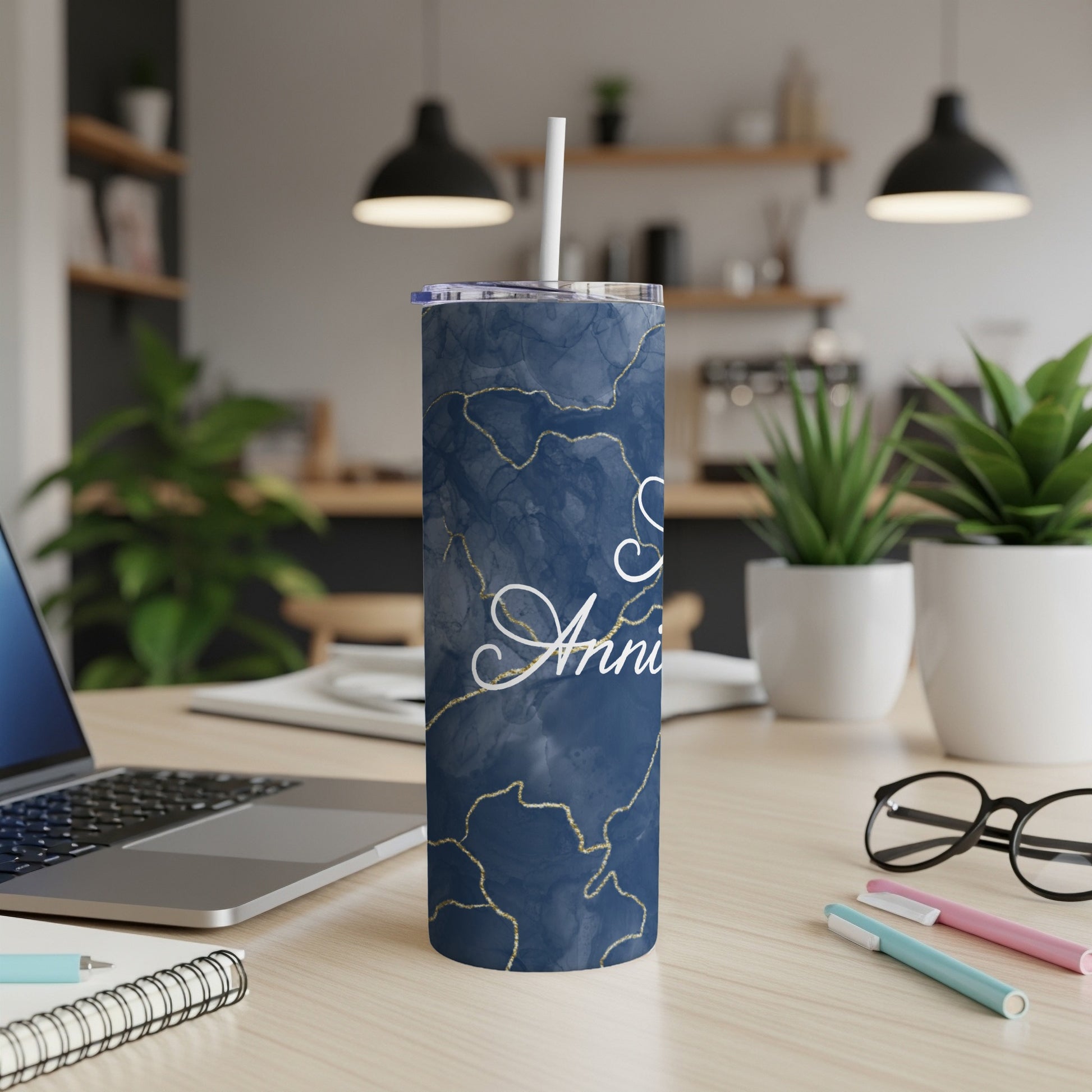 Blue marble tumbler with "Anniversary" text and gold accents.