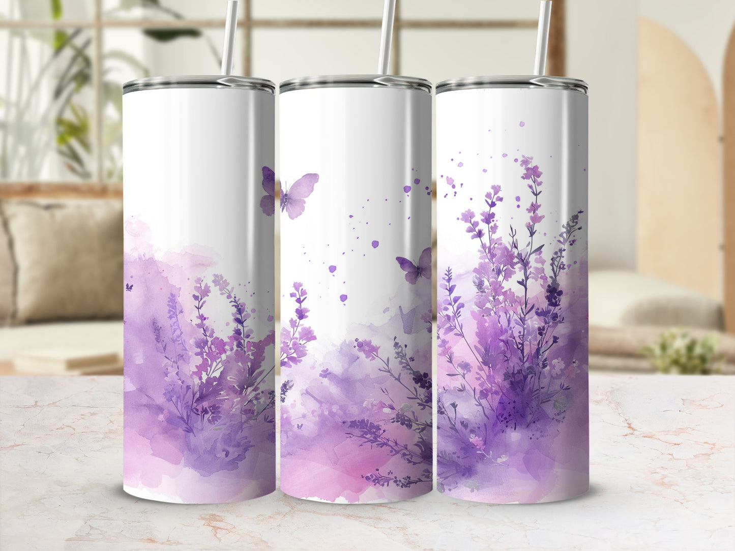 Three tumblers with purple watercolor floral and butterfly designs.