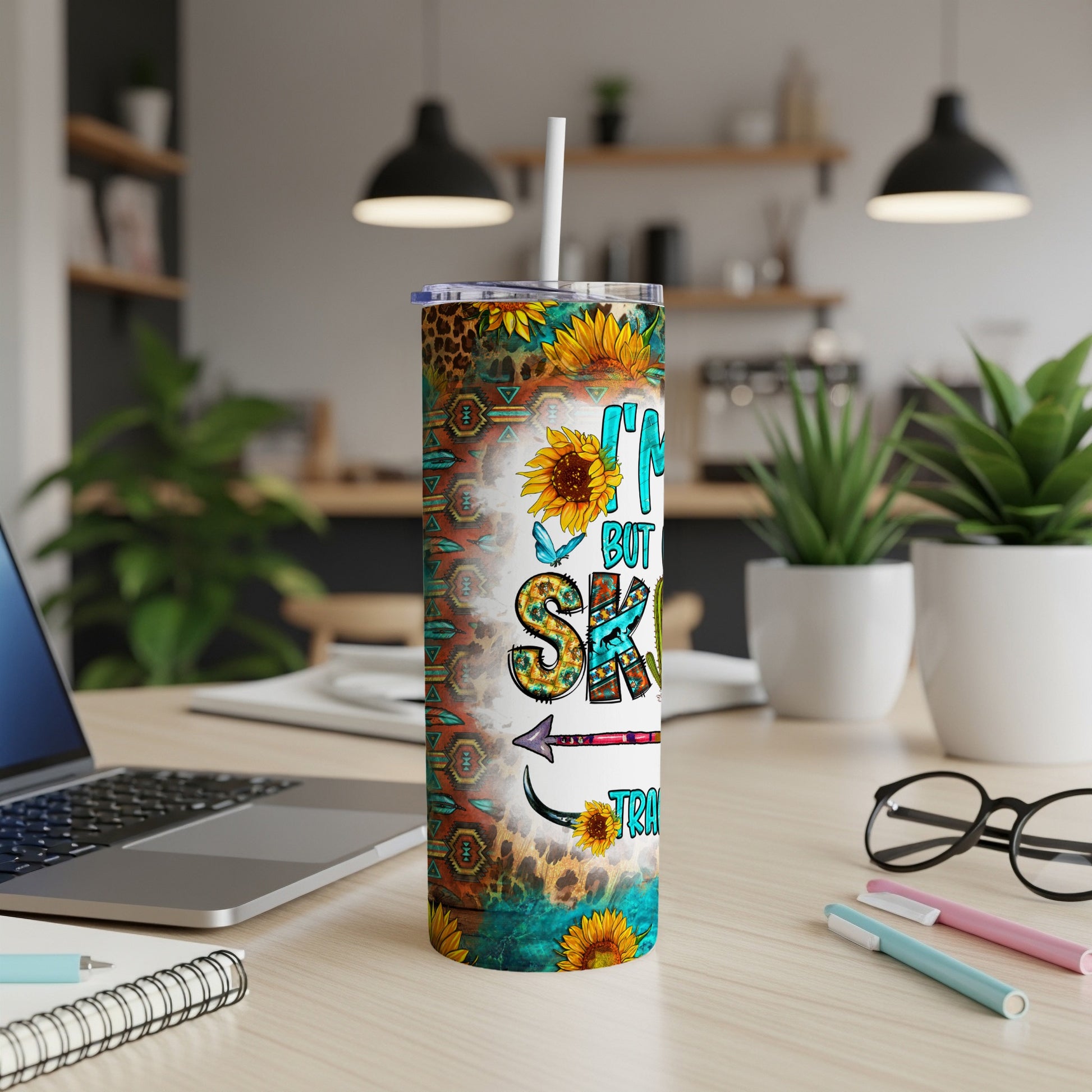 Tumbler with sunflowers, leopard print, and "I'm not lazy but I'm saving energy" text.