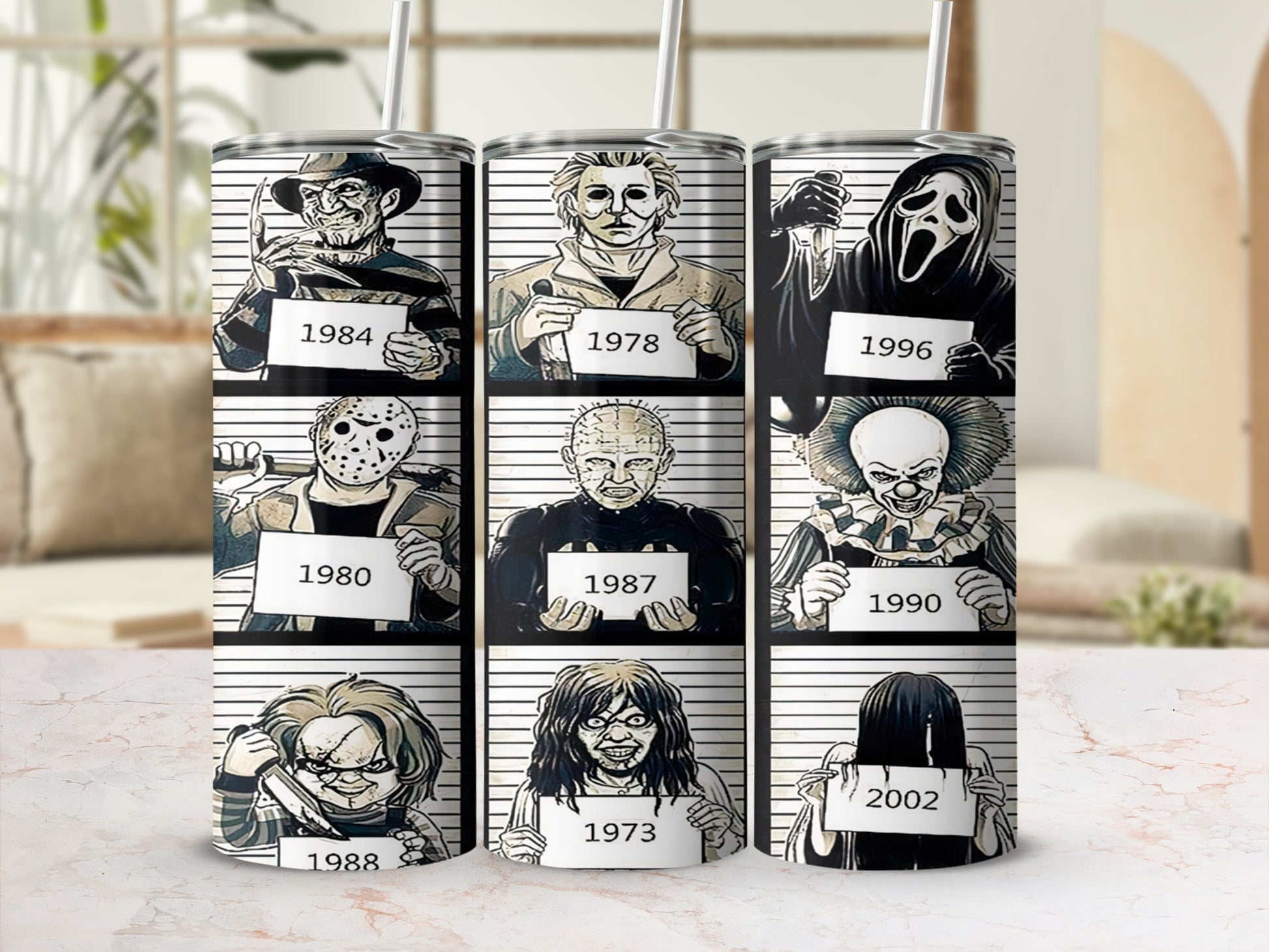 Three tumblers with horror movie characters in mugshot style, each holding a sign with a year.