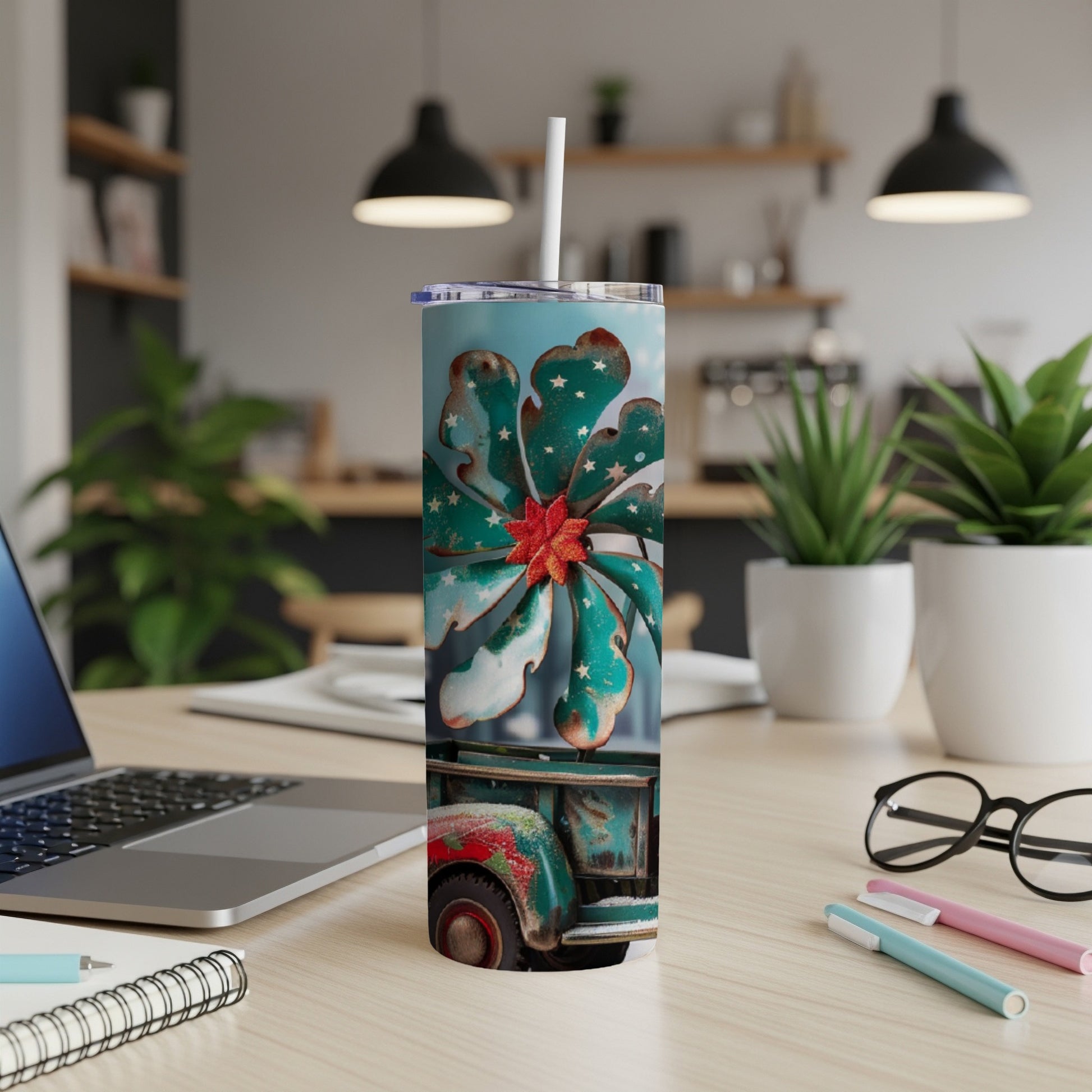 Tumbler with vintage truck and patriotic star design on desk.