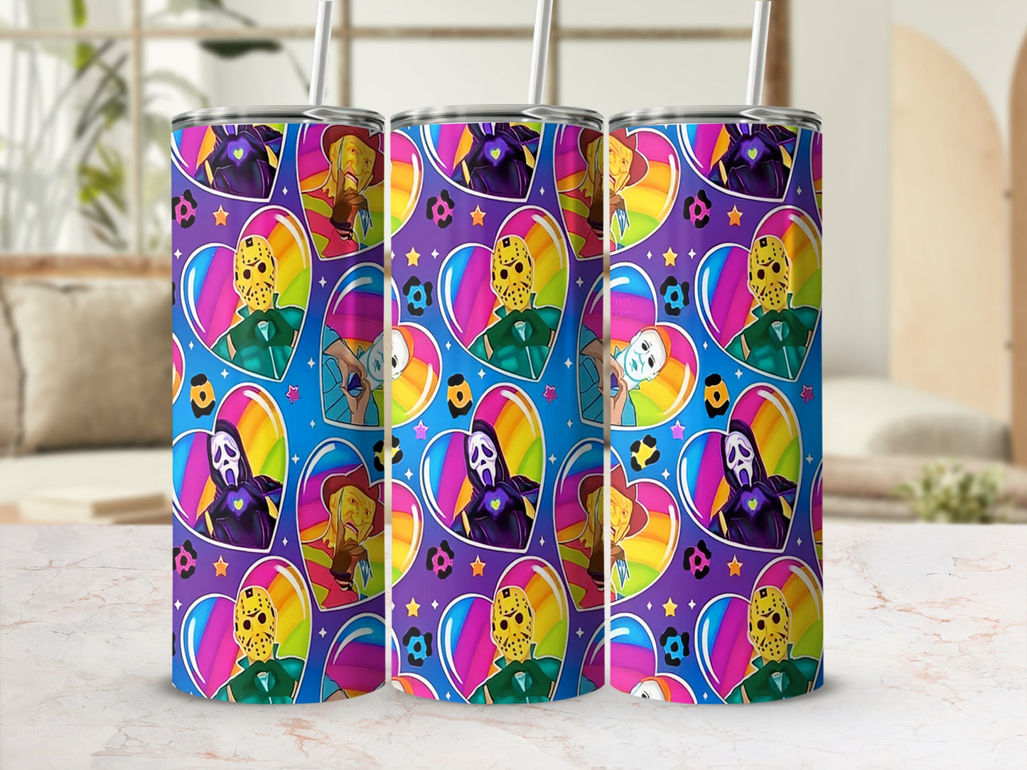 Tumbler with horror character icons and rainbow hearts pattern.