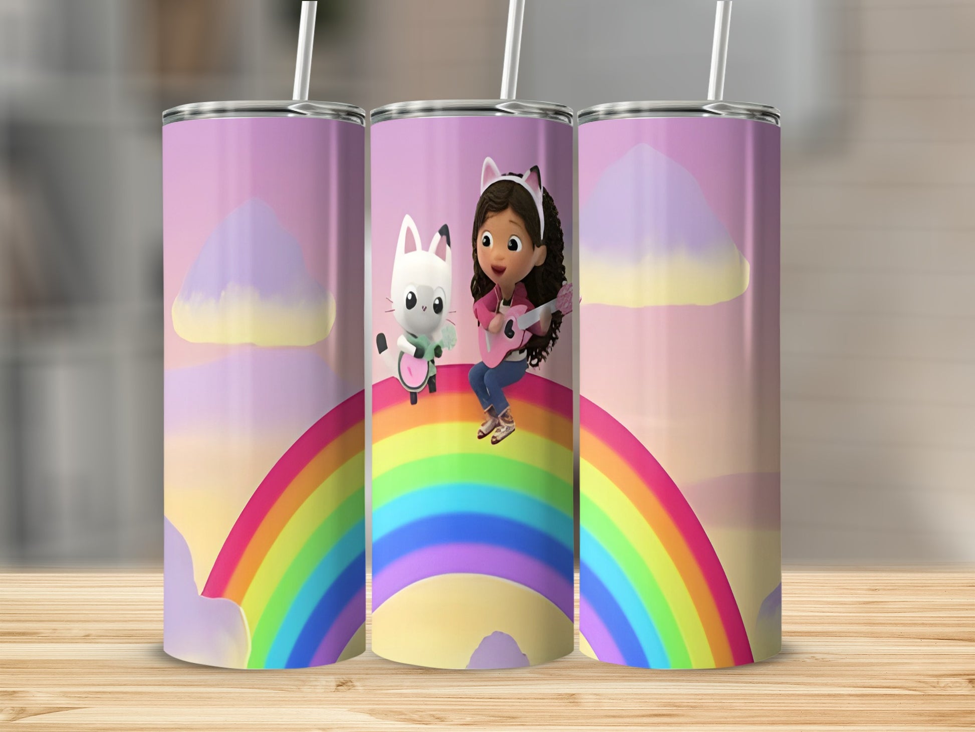 Gabby's Dollhouse characters on a rainbow with fluffy clouds and pastel sky.