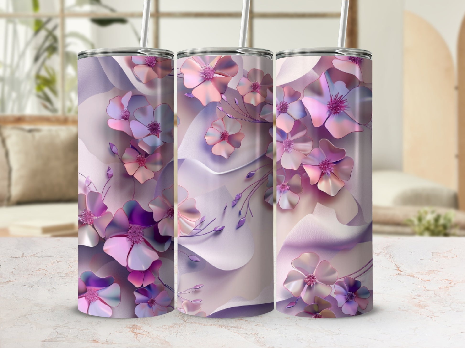 Three tumblers with a pastel floral design featuring pink and purple flowers.