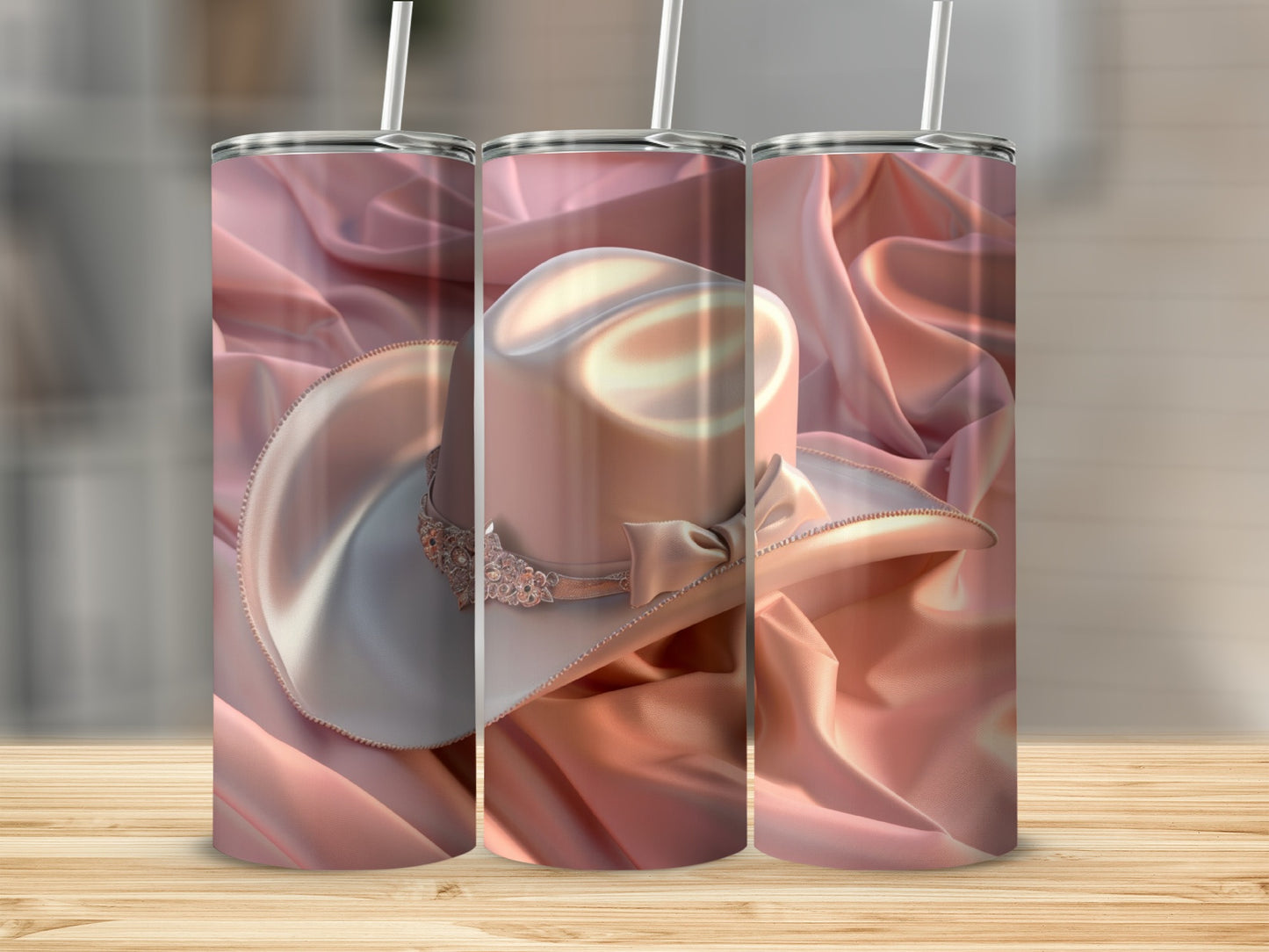 Pink satin tumbler with a cowboy hat design.