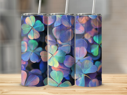 Three tumblers with a colorful clover leaf pattern.