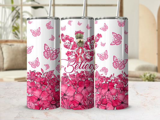 Pink butterflies, flowers, and "Believe" text on a tumbler.